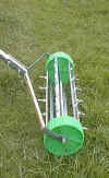 rolling lawn aerator